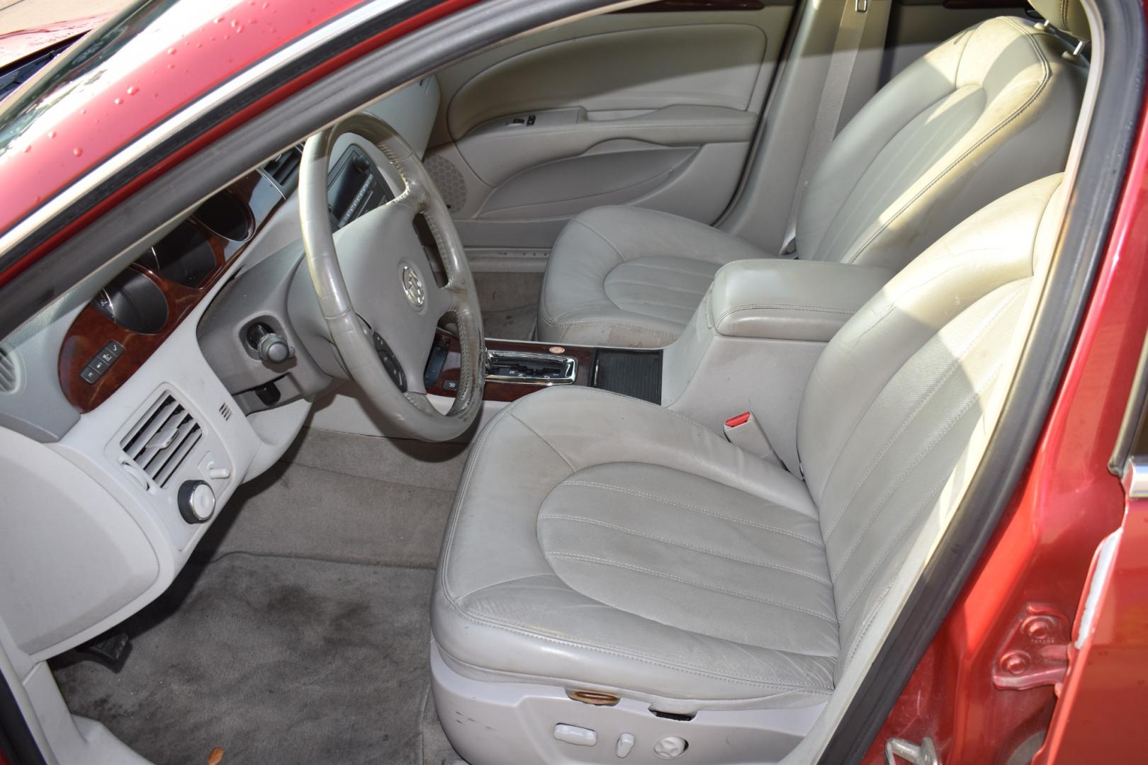 2007 Red /Tan Buick Lucerne CXL V8 (1G4HR57Y07U) with an 4.6L V8 DOHC 32V engine, 4-Speed Automatic Overdrive transmission, located at 5925 E. BELKNAP ST., HALTOM CITY, TX, 76117, (817) 834-4222, 32.803799, -97.259003 - Buying a 2007 Buick Lucerne can offer several benefits, depending on your needs and preferences. Here are some potential advantages: Comfortable Ride: Buick is known for prioritizing comfort, and the Lucerne is no exception. It typically offers a smooth and comfortable ride, making it ideal for lon - Photo#9